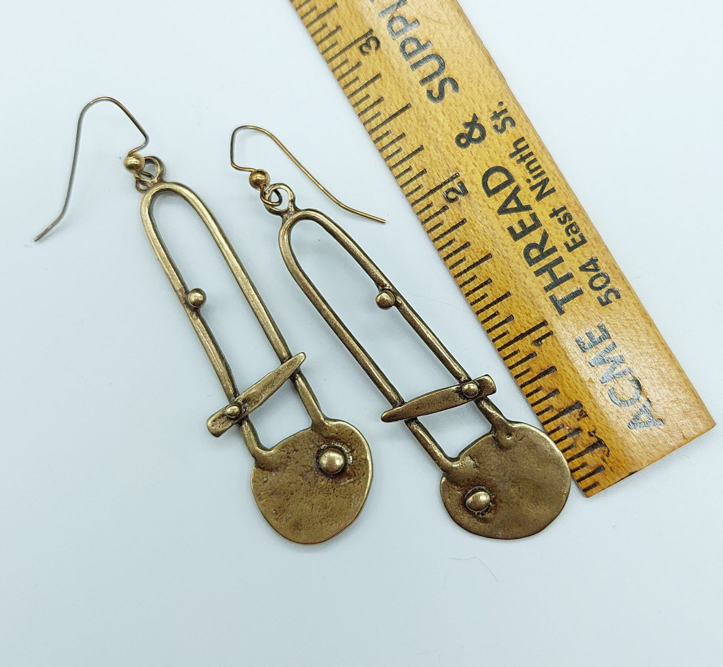 Antiqued gold tone architectural earrings