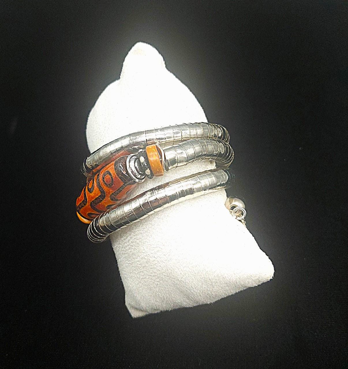 Burnt orange Tibetan nine-eyed Dzi bead wrap bracelet. One size fits most.
