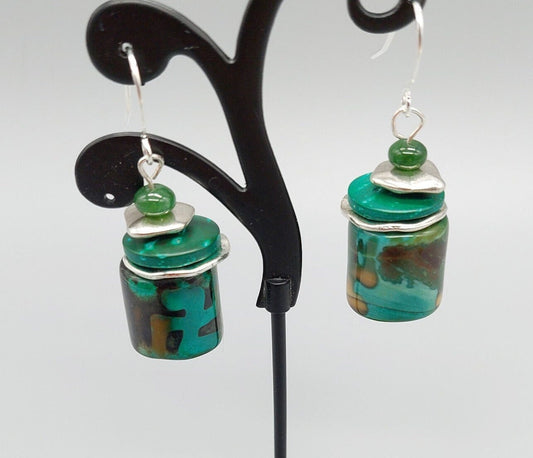 Green multi toned earrings with silver discs